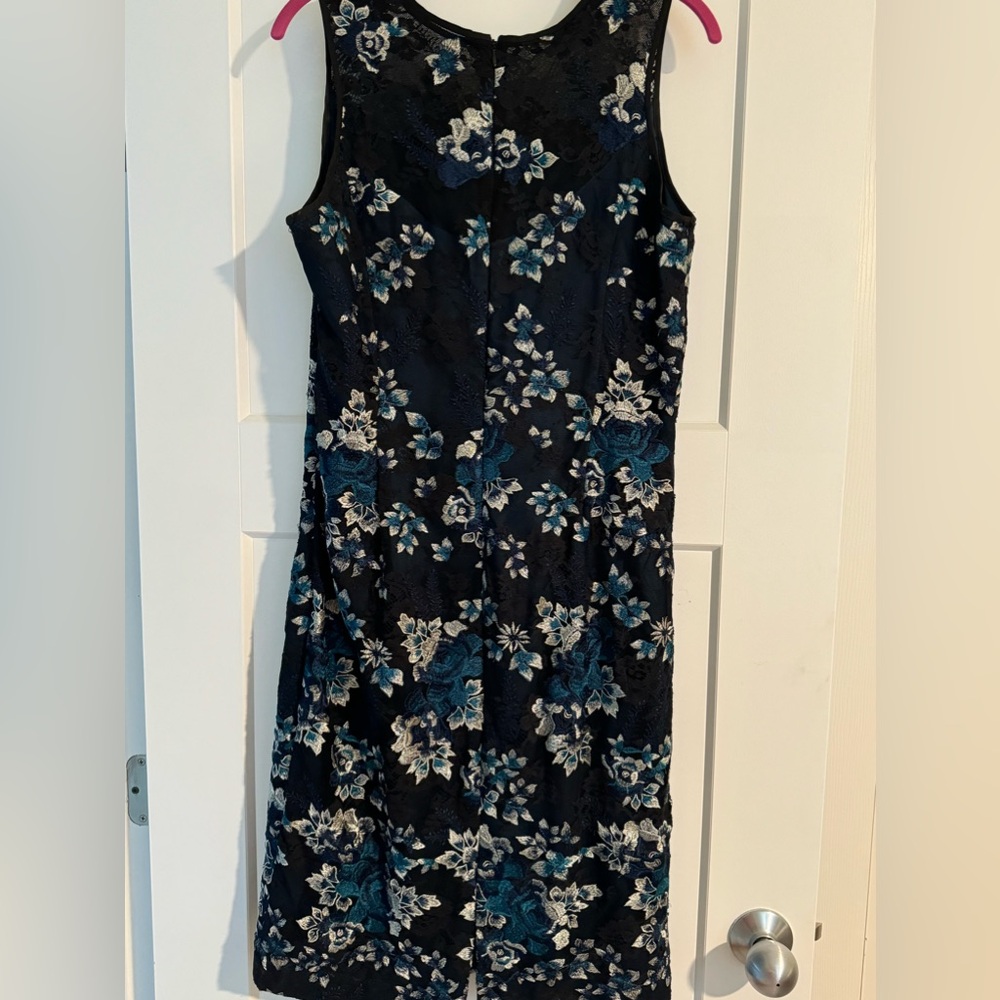 Black lace dress with silver and turquoise colored flowers.